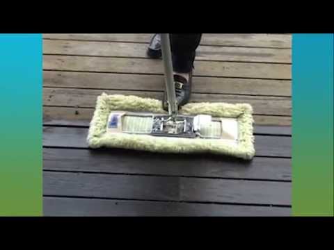 Using a Green Floor Mop to Scrub